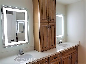 11 South 3rd Street, Unit 503 Alhambra, CA 91801 - Photo 11 of 13 a bathroom with a sink and a mirror