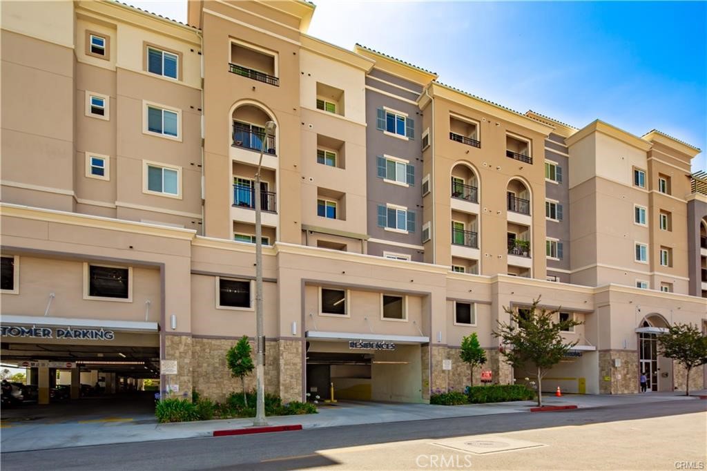 11 South 3rd Street, Unit 503 Alhambra, CA 91801 - Photo 2 of 13 a front view of a building with a road