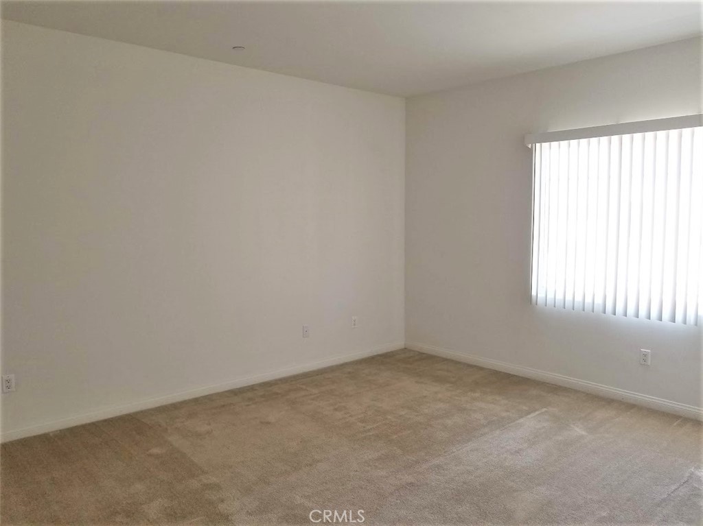 11 South 3rd Street, Unit 503 Alhambra, CA 91801 - Photo 10 of 13 an empty room with a window