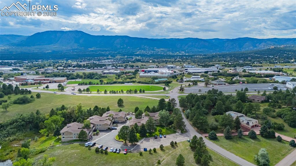 1679 Deer Creek Road Monument, CO 80132 - Photo 20 of 21 Drone / aerial view of a mountain backdrop