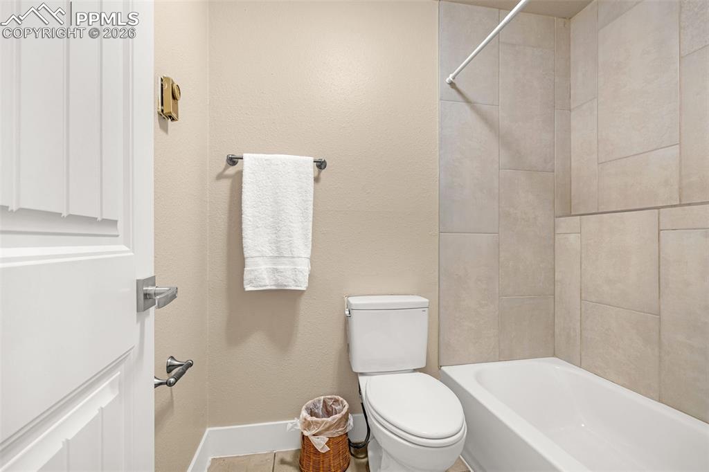 1679 Deer Creek Road Monument, CO 80132 - Photo 6 of 21 Bathroom with toilet and shower / bathtub combination