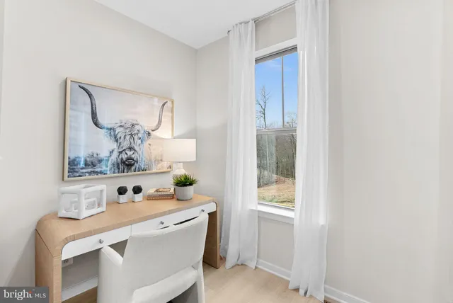 a kitchen with a stove and cabinets