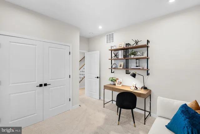 a view of a balcony with furniture