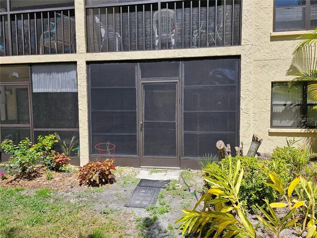 a view of a lake with a house in the background