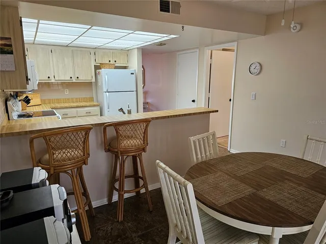 a bedroom with bed and window