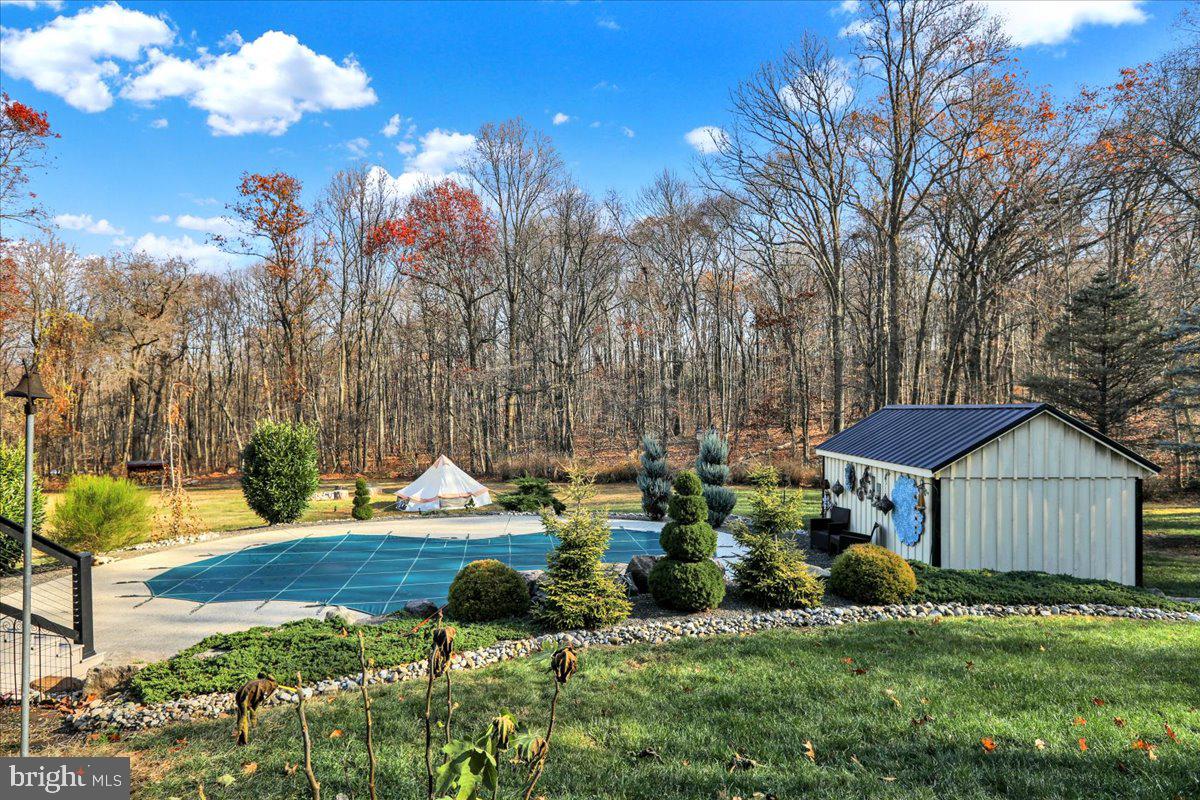 2880 Chestnut Hill Road Pottstown, PA 19465 - Photo 32 of 39 Inground Pool area with Pool house