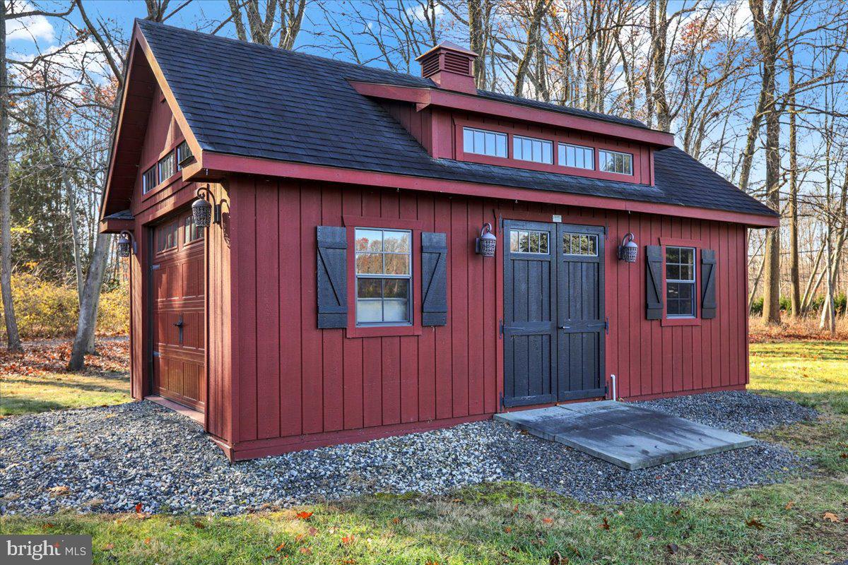 2880 Chestnut Hill Road Pottstown, PA 19465 - Photo 34 of 39 Oversized Shed with overhead door and loft storage