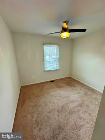 a view of a backyard of the house