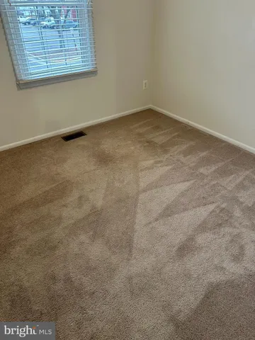 a bathroom with a toilet a sink and shower