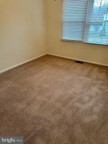 a view of a backyard of the house