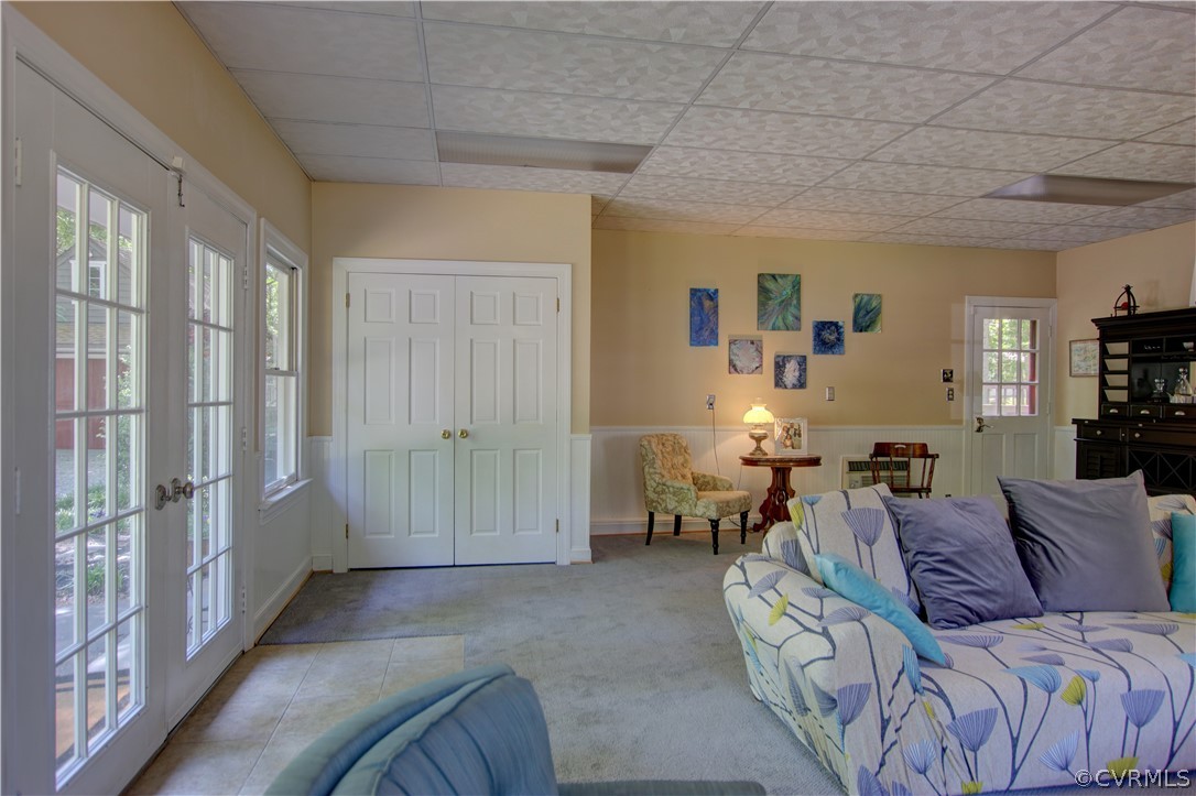 13711 Elmstead Road Midlothian, VA 23113 - Photo 32 of 47 a living room with furniture and a window