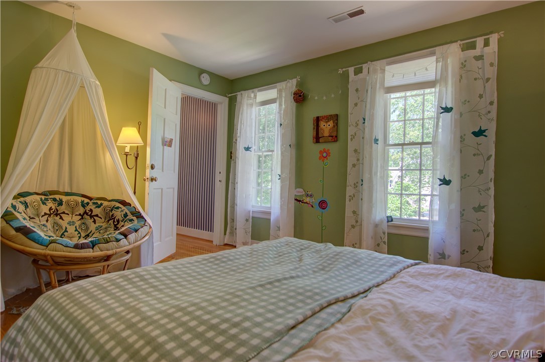 13711 Elmstead Road Midlothian, VA 23113 - Photo 41 of 47 a bedroom with a bed and a window