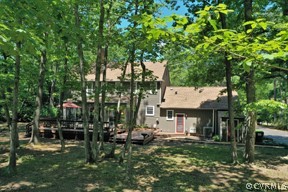 13711 Elmstead Road Midlothian, VA 23113 - Photo 45 of 47 a view of a house with a yard and sitting area