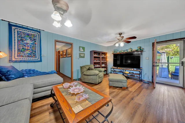 a view of a bathroom with a tub and shower