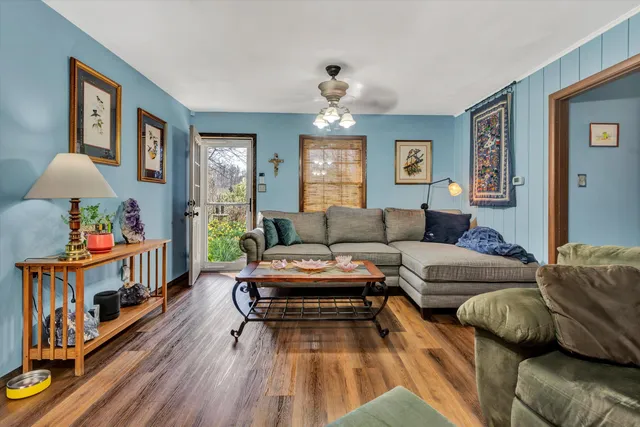 a bathroom with a sink a mirror and a shower
