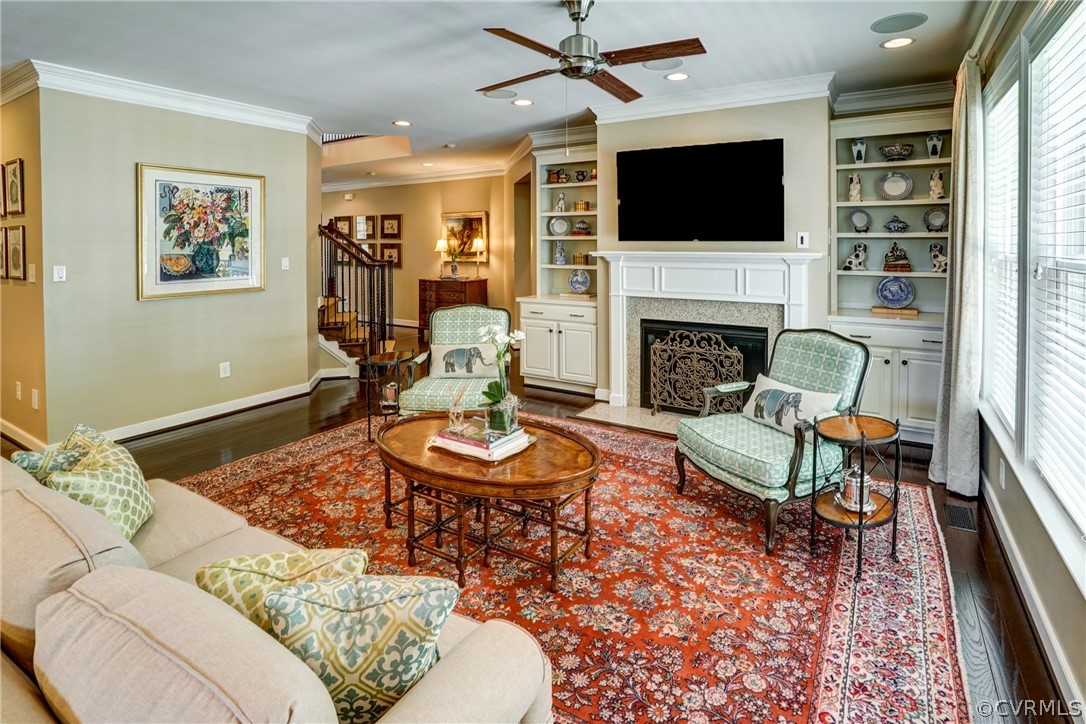 165 Button Bush Road Richmond, VA 23238 - Photo 19 of 50 a living room with furniture a flat screen tv and a fireplace