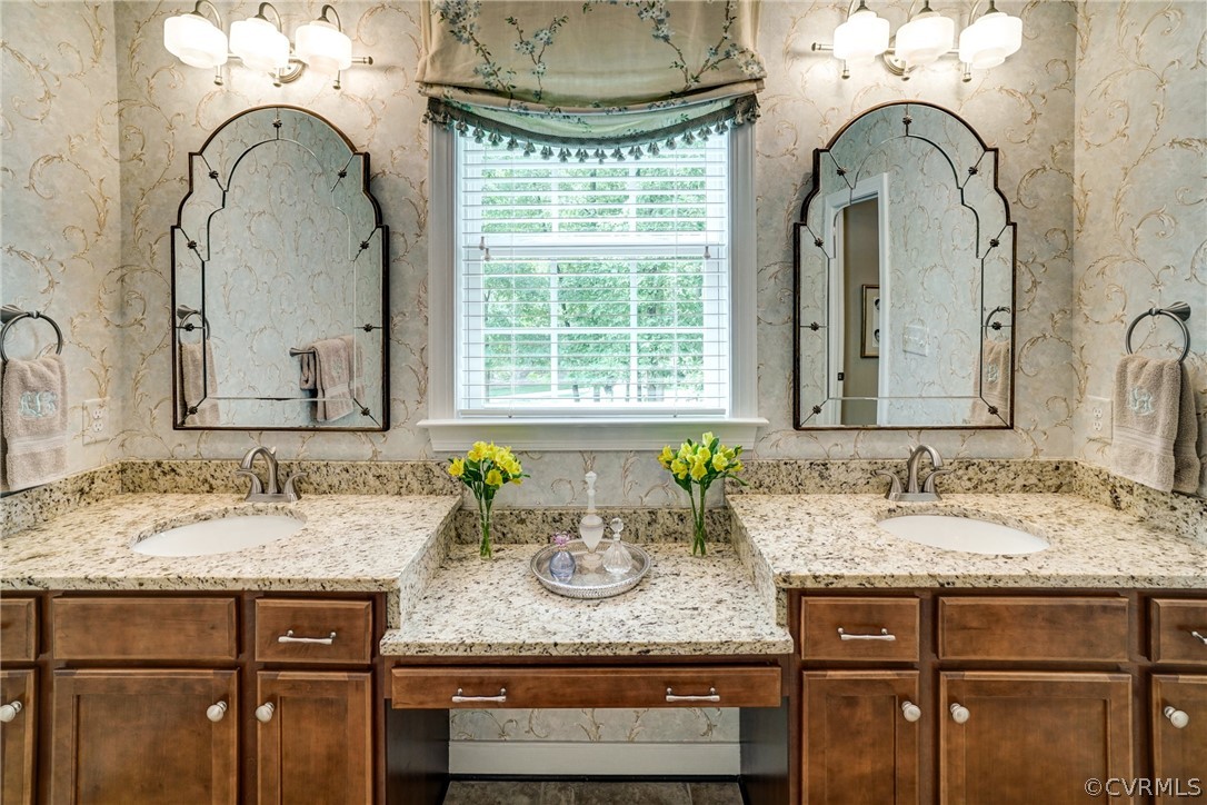 165 Button Bush Road Richmond, VA 23238 - Photo 29 of 50 a bathroom with a granite countertop sink a mirror and a window