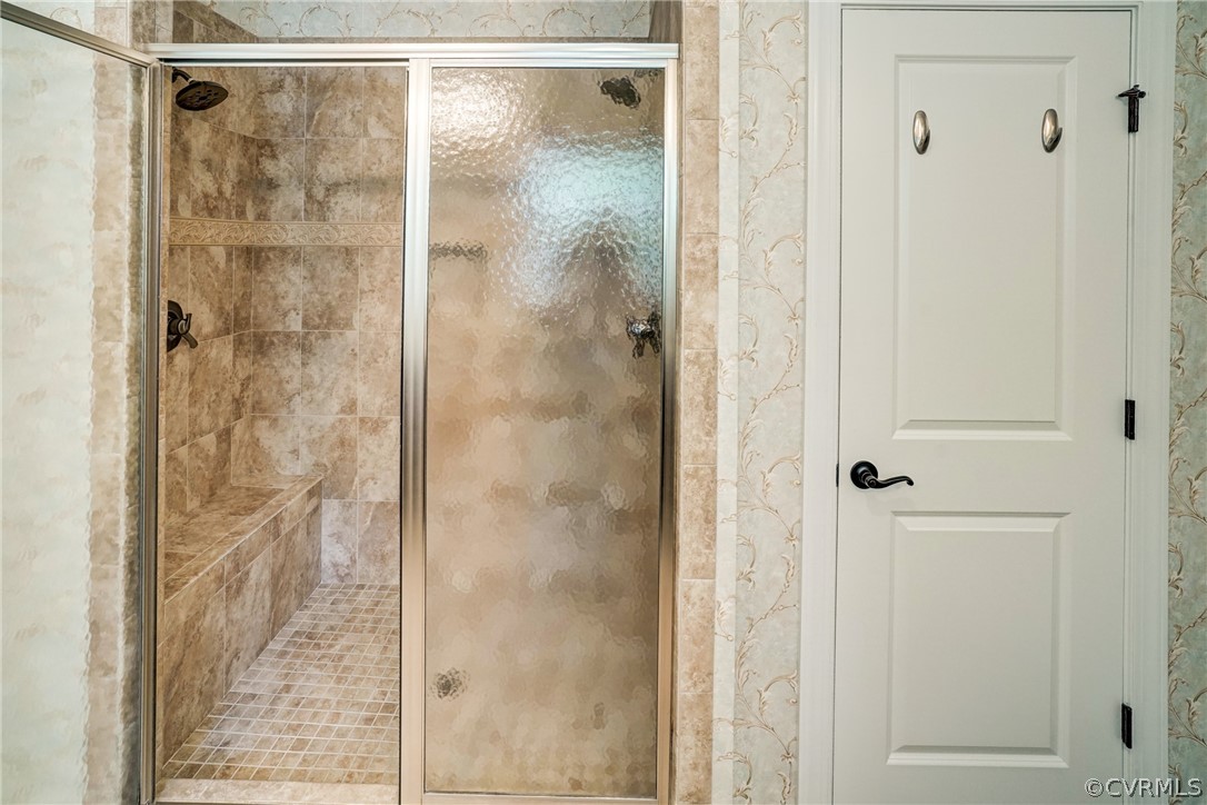165 Button Bush Road Richmond, VA 23238 - Photo 31 of 50 a bathroom with a glass shower door