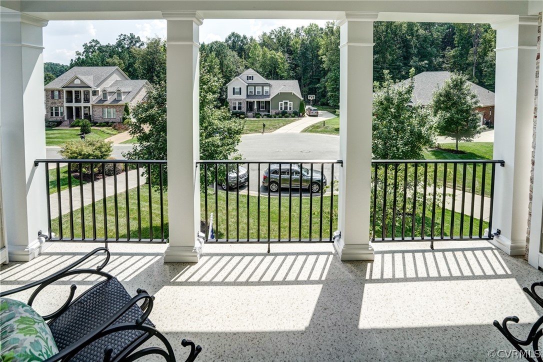 165 Button Bush Road Richmond, VA 23238 - Photo 39 of 50 a view of a house with a deck and furniture