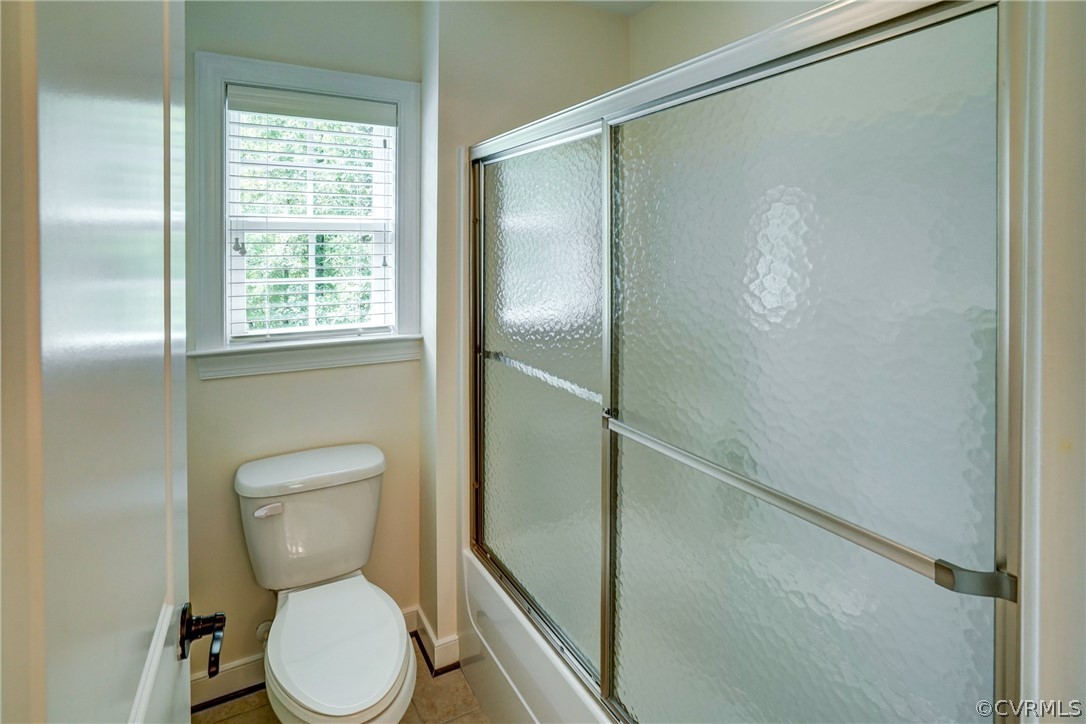 165 Button Bush Road Richmond, VA 23238 - Photo 46 of 50 a white toilet sitting next to a window