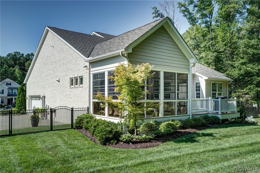 165 Button Bush Road Richmond, VA 23238 - Photo 50 of 50 a view of a house with backyard and garden