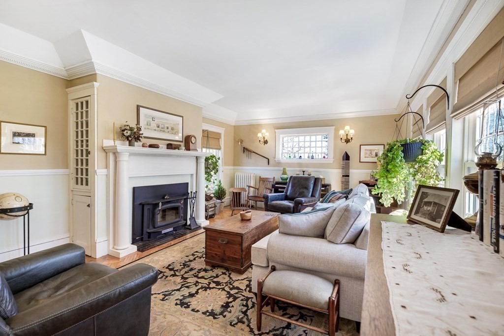 2 Clifton Park Melrose, MA 02176 - Photo 14 of 28 a living room with furniture and a fireplace