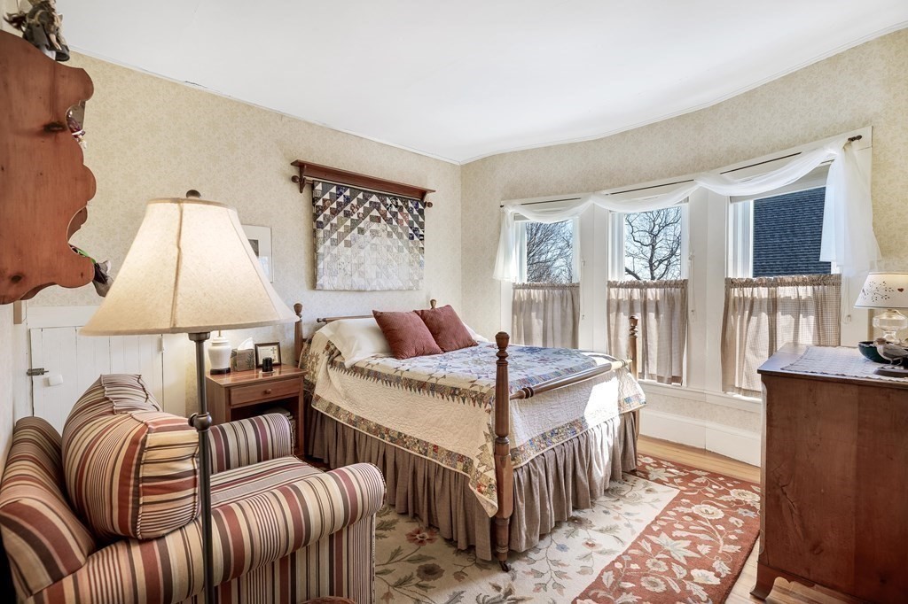 2 Clifton Park Melrose, MA 02176 - Photo 20 of 28 a bedroom with furniture and a large window