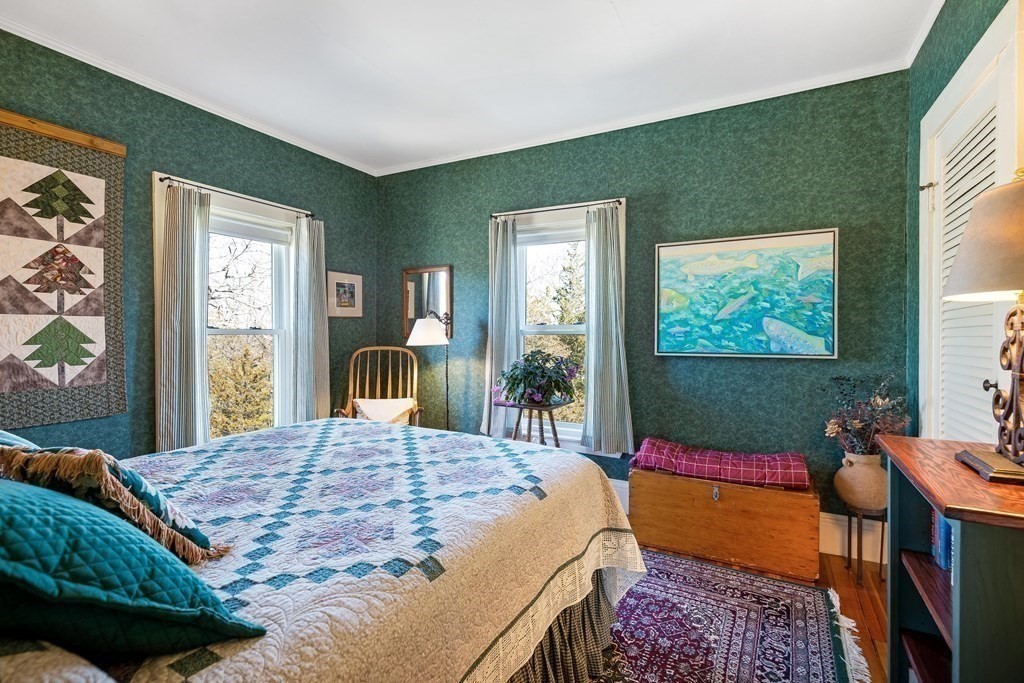 2 Clifton Park Melrose, MA 02176 - Photo 22 of 28 a bed sitting in a bedroom next to a window