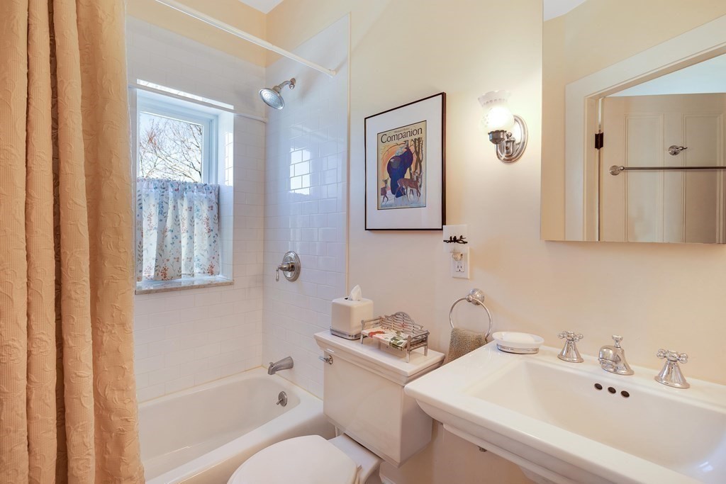 2 Clifton Park Melrose, MA 02176 - Photo 23 of 28 a bathroom with a sink and a bathtub