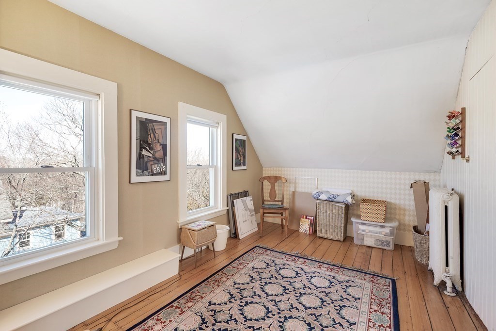 2 Clifton Park Melrose, MA 02176 - Photo 27 of 28 a living room with furniture and a rug