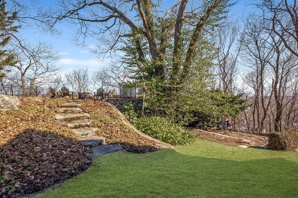 2 Clifton Park Melrose, MA 02176 - Photo 4 of 28 a view of a yard with large trees