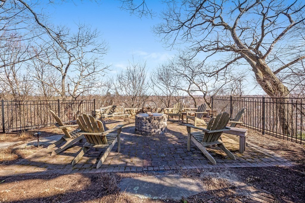 2 Clifton Park Melrose, MA 02176 - Photo 5 of 28 a backyard of a house with table and chairs