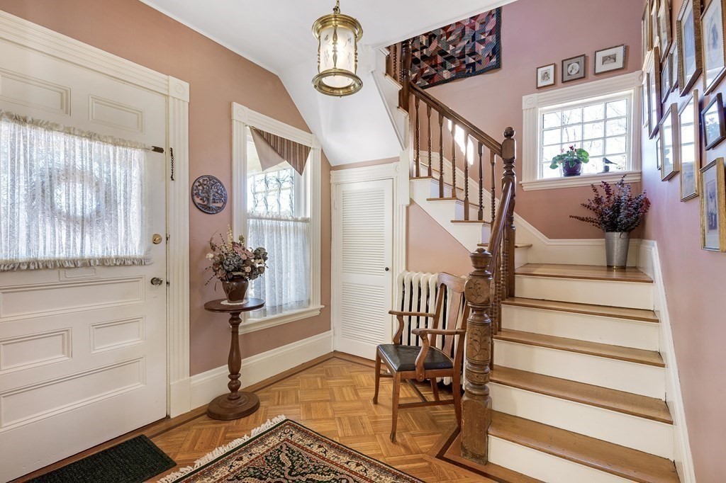 2 Clifton Park Melrose, MA 02176 - Photo 8 of 28 a view of entryway livingroom and hall with wooden floor