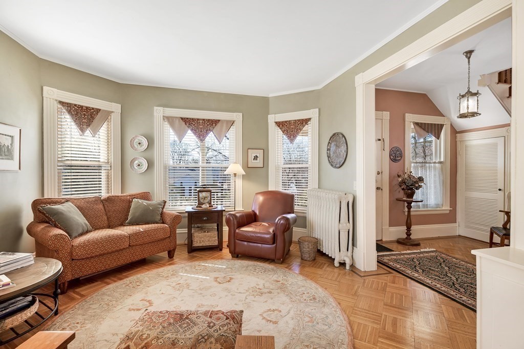 2 Clifton Park Melrose, MA 02176 - Photo 9 of 28 a living room with furniture and a large window