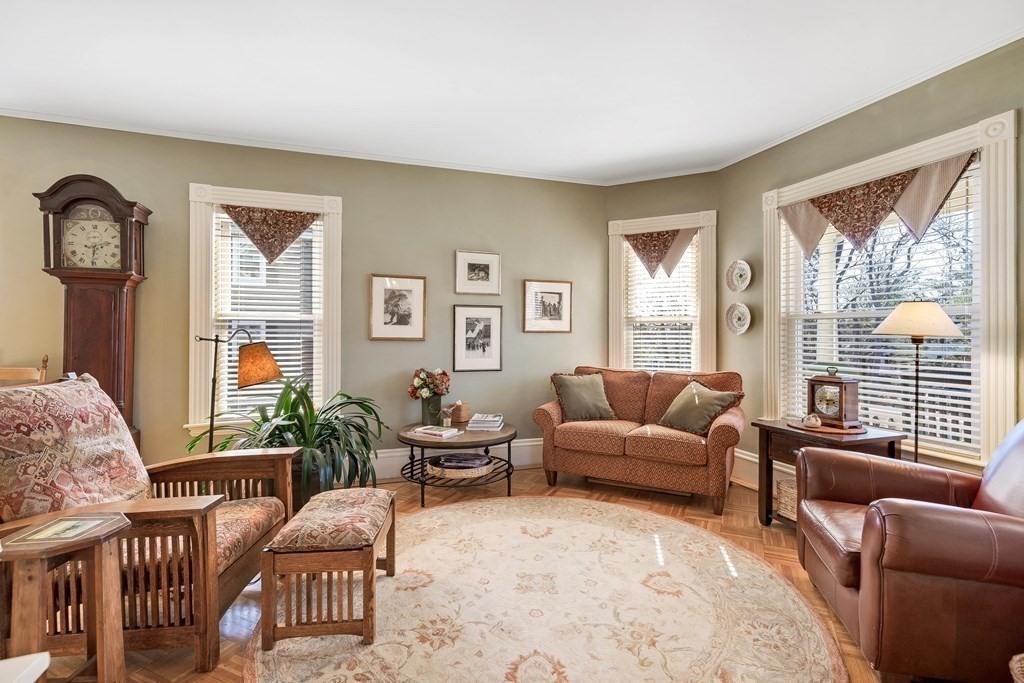 2 Clifton Park Melrose, MA 02176 - Photo 10 of 28 a living room with furniture and a large window