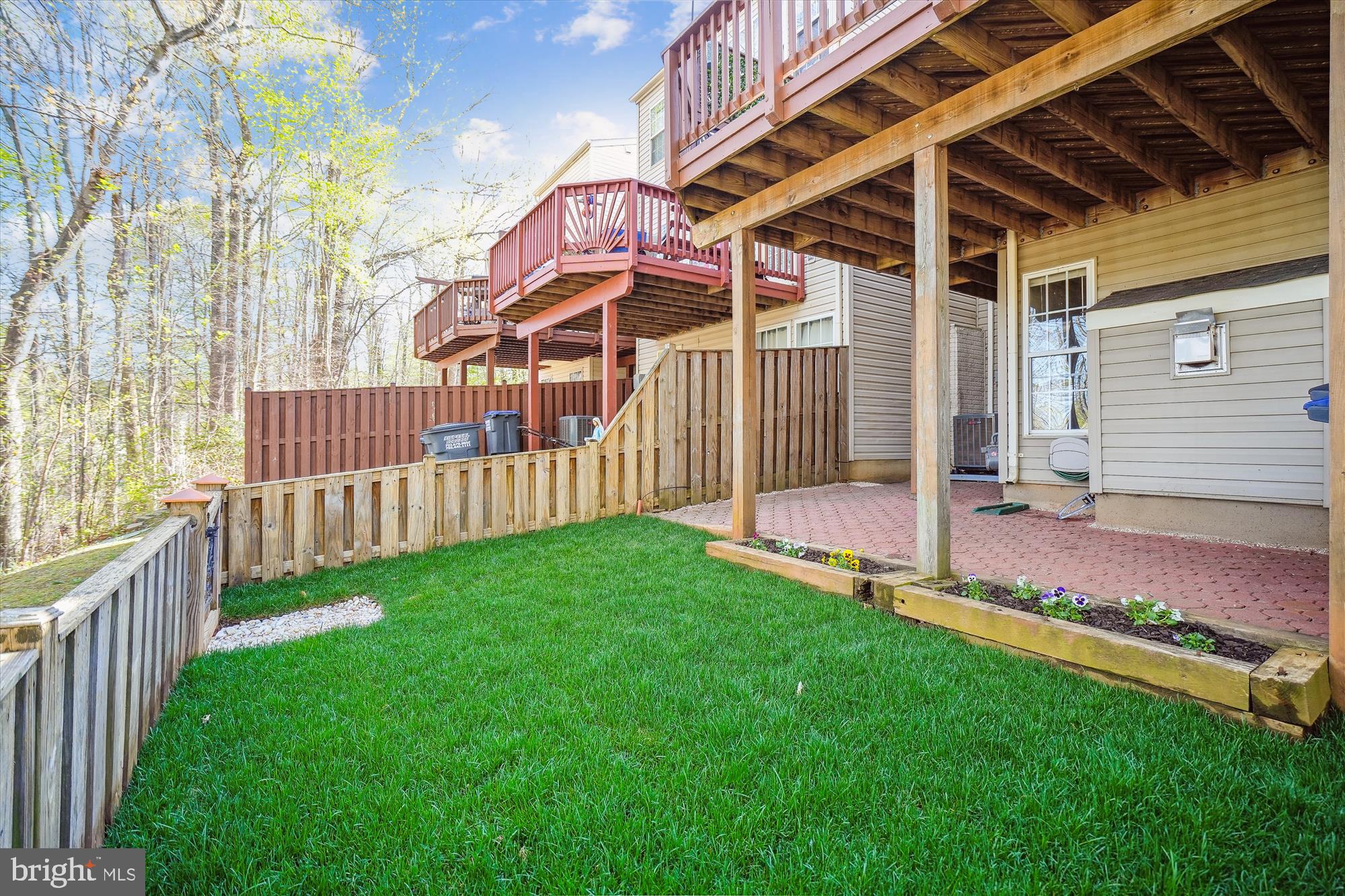 15761 Viewpoint Circle Dumfries, VA 22025 - Photo 28 of 46 a view of a porch with a yard