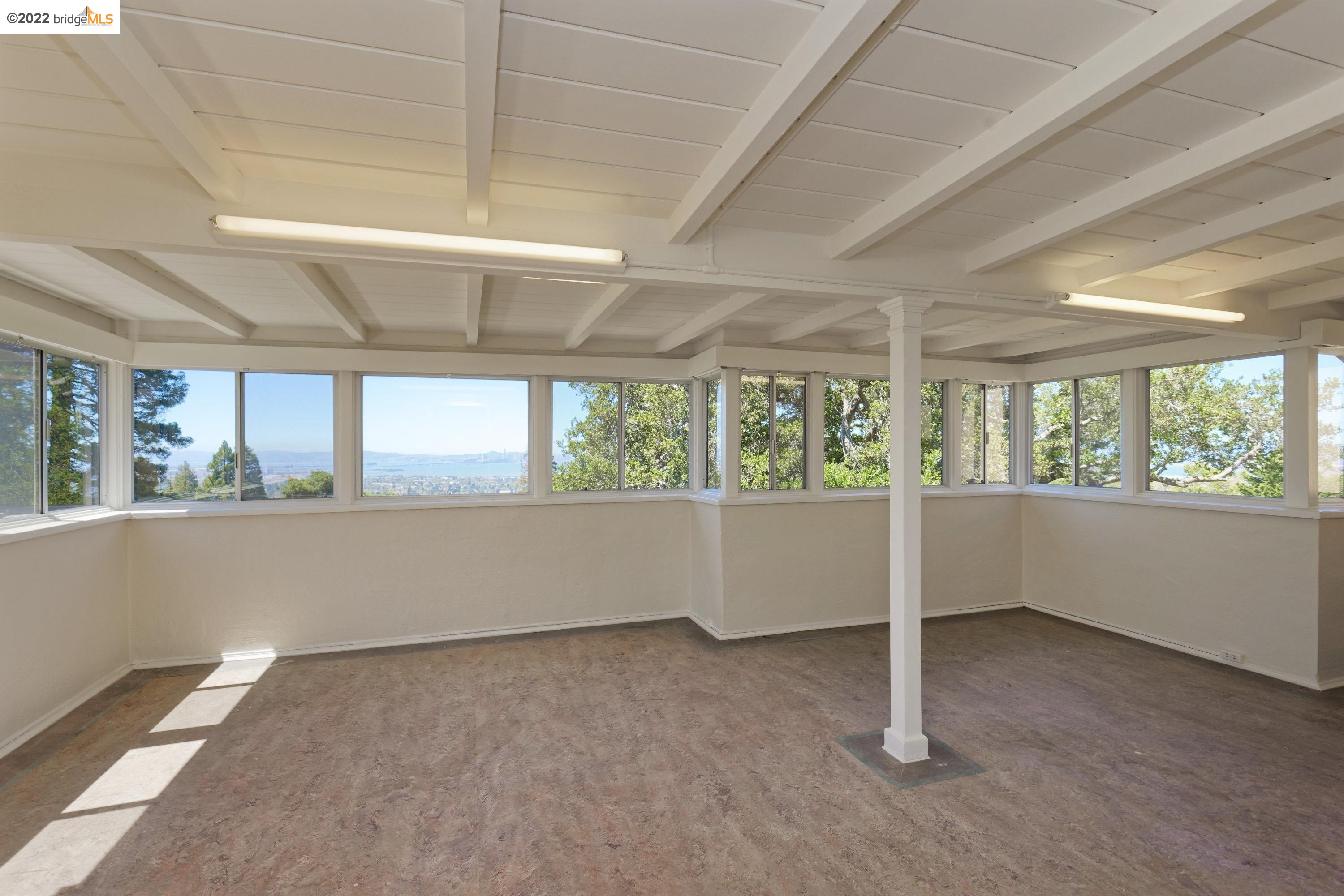 920 Spruce Street Berkeley, CA 94707 - Photo 25 of 36 a view of an empty room with a window