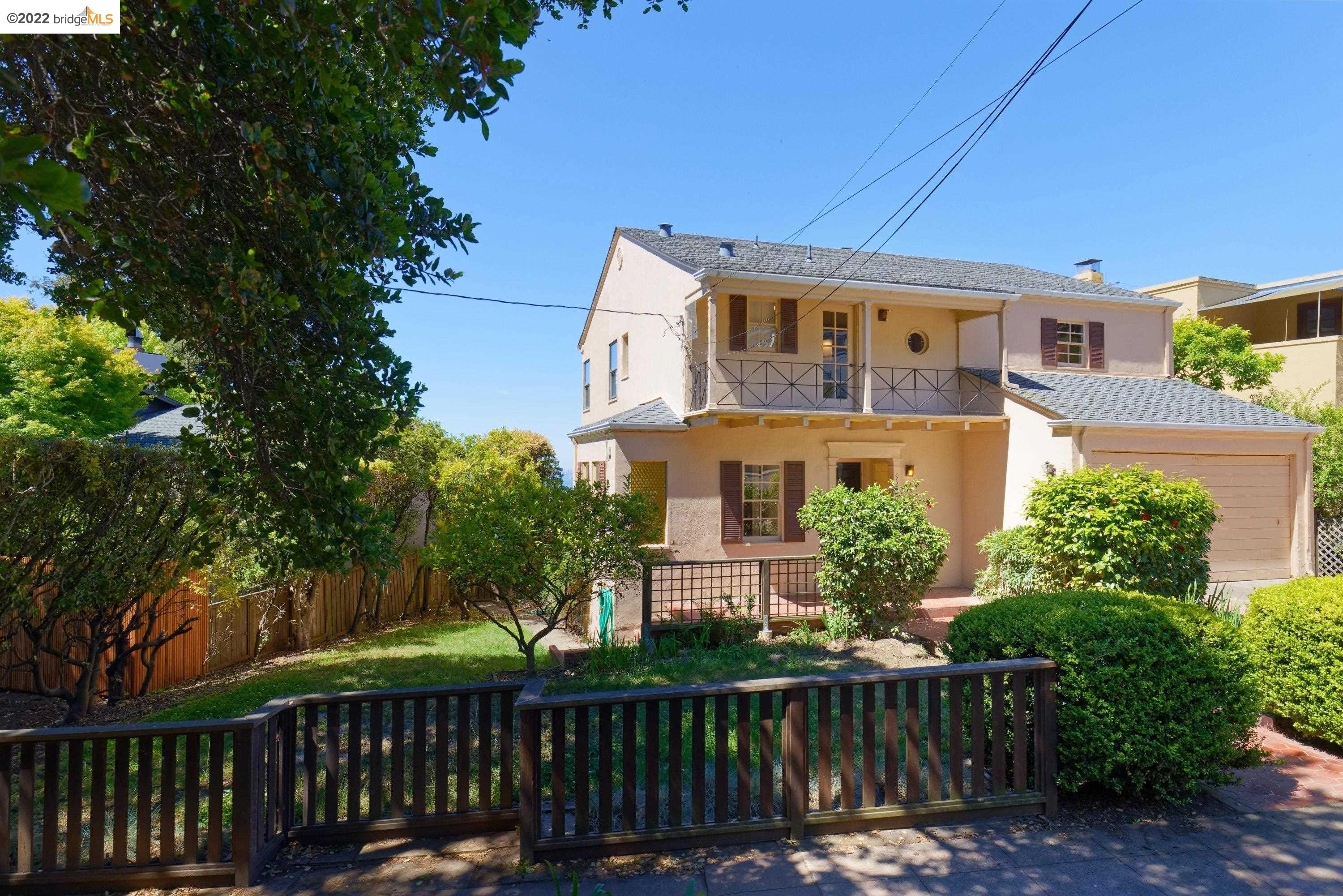 920 Spruce Street Berkeley, CA 94707 - Photo 3 of 36 a front view of a house with a garden