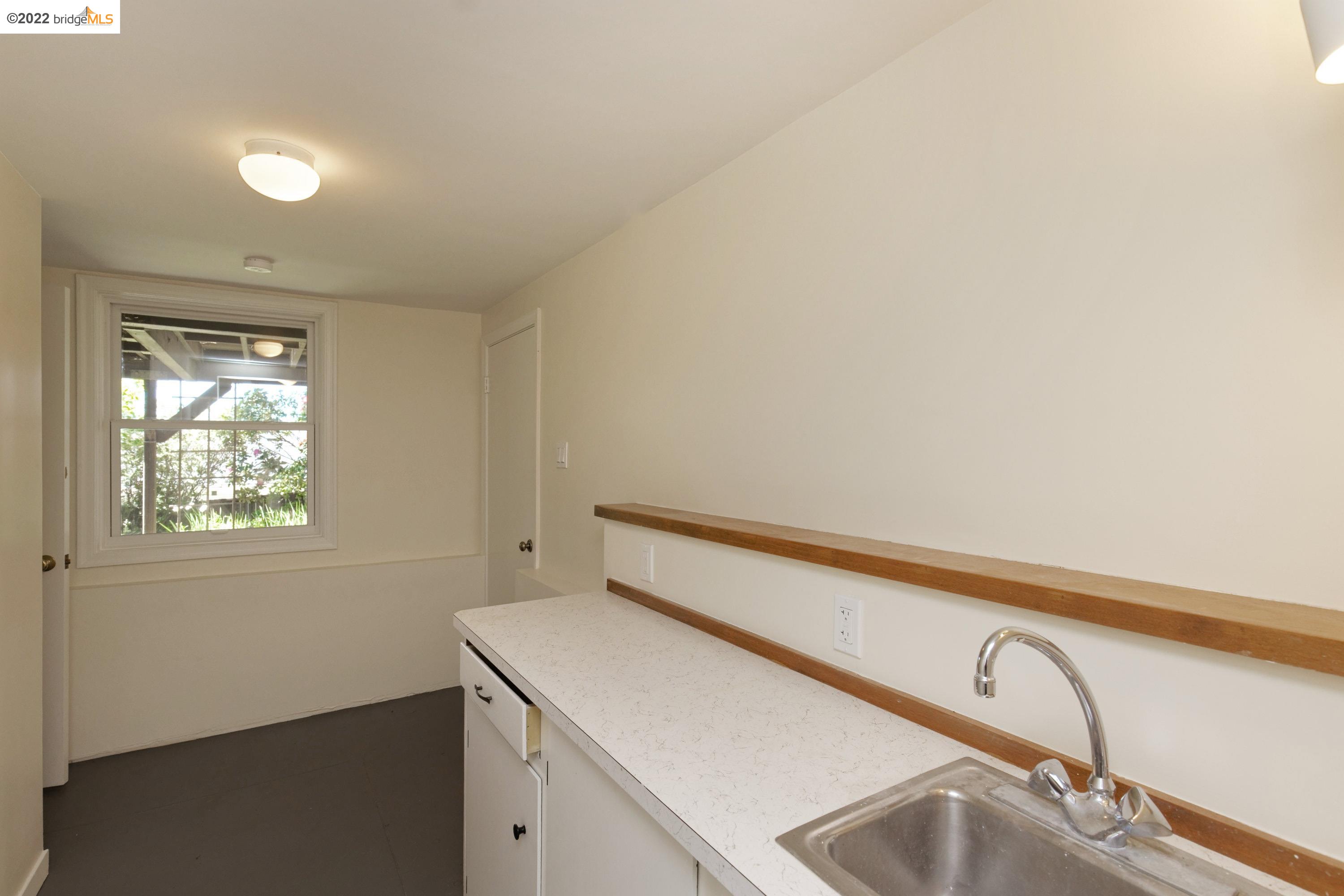920 Spruce Street Berkeley, CA 94707 - Photo 31 of 36 a utility room with a sink