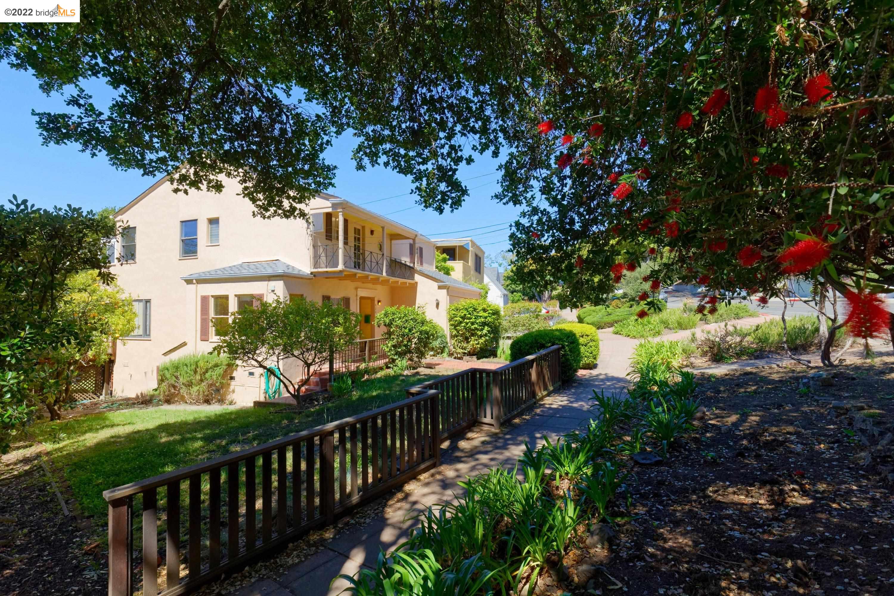 920 Spruce Street Berkeley, CA 94707 - Photo 4 of 36 a front view of a house with a yard