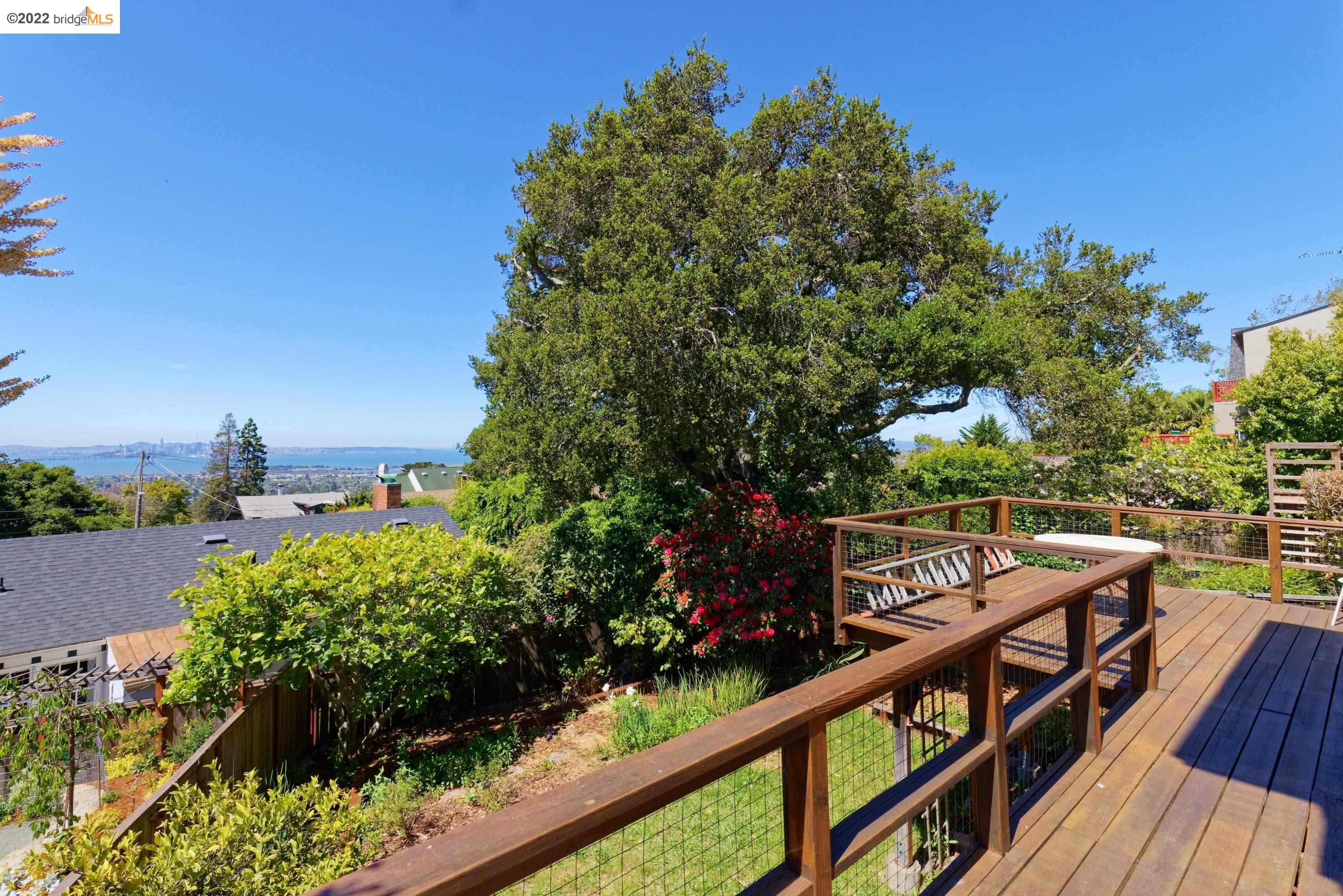 920 Spruce Street Berkeley, CA 94707 - Photo 5 of 36 a view of a balcony with wooden fence and floor
