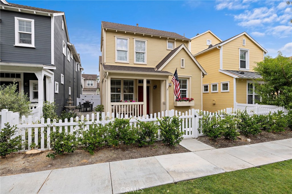15 Honey Tree Ladera Ranch, CA 92694 - Photo 10 of 51 a view of a white house with large windows and plants