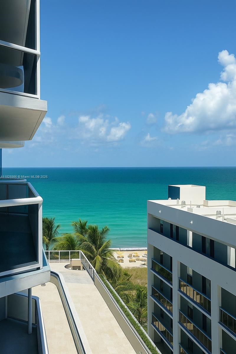 6301 Collins Avenue, Unit 1005 Miami Beach, FL 33141 - Photo 12 of 35 a view of a balcony with furniture