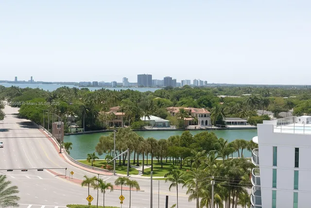 a view of a lake with a city