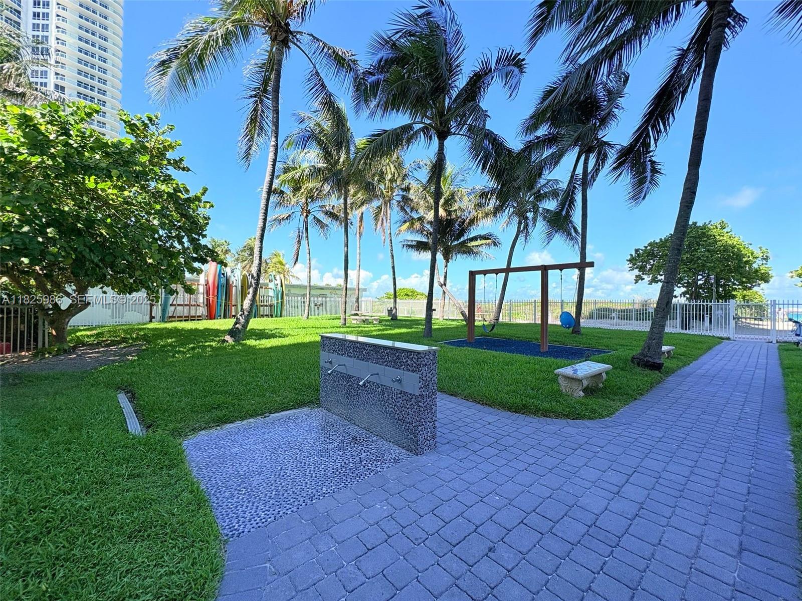 6301 Collins Avenue, Unit 1005 Miami Beach, FL 33141 - Photo 24 of 35 a view of a park and trees