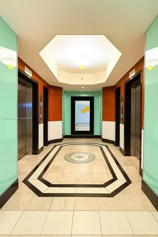 a view of front door with yard