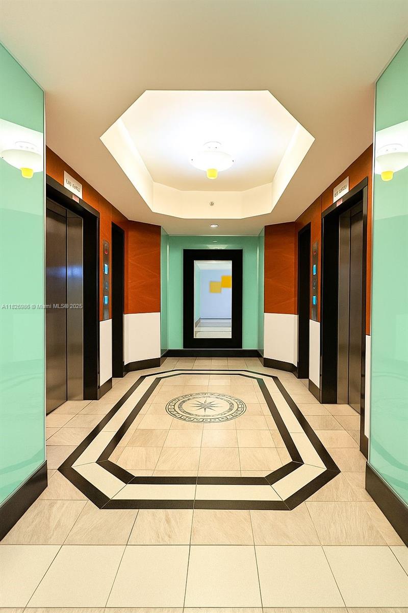 6301 Collins Avenue, Unit 1005 Miami Beach, FL 33141 - Photo 30 of 35 a view of front door with yard