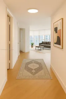 a view of a livingroom with furniture and window