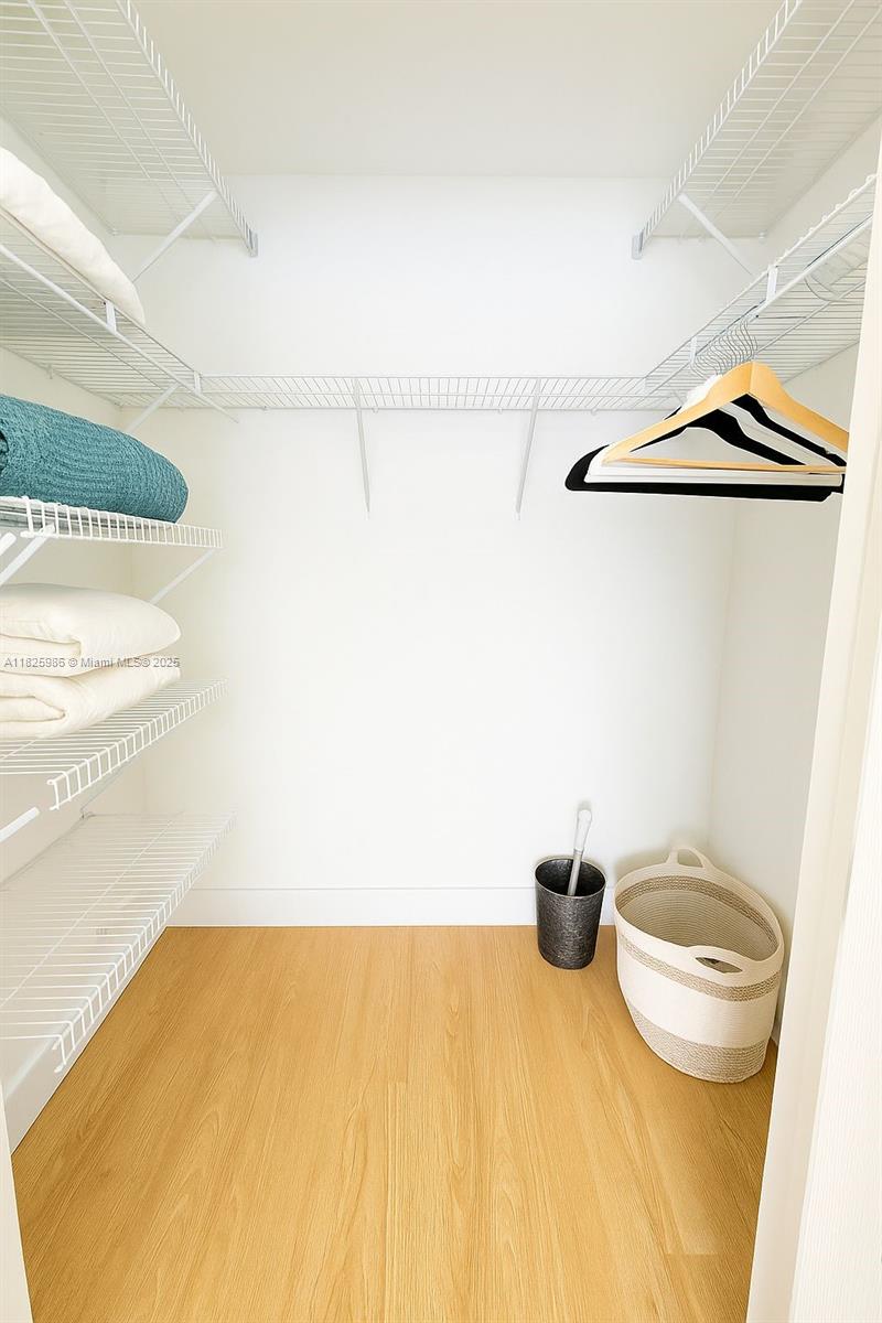 6301 Collins Avenue, Unit 1005 Miami Beach, FL 33141 - Photo 10 of 35 a bathroom with a sink and a toilet