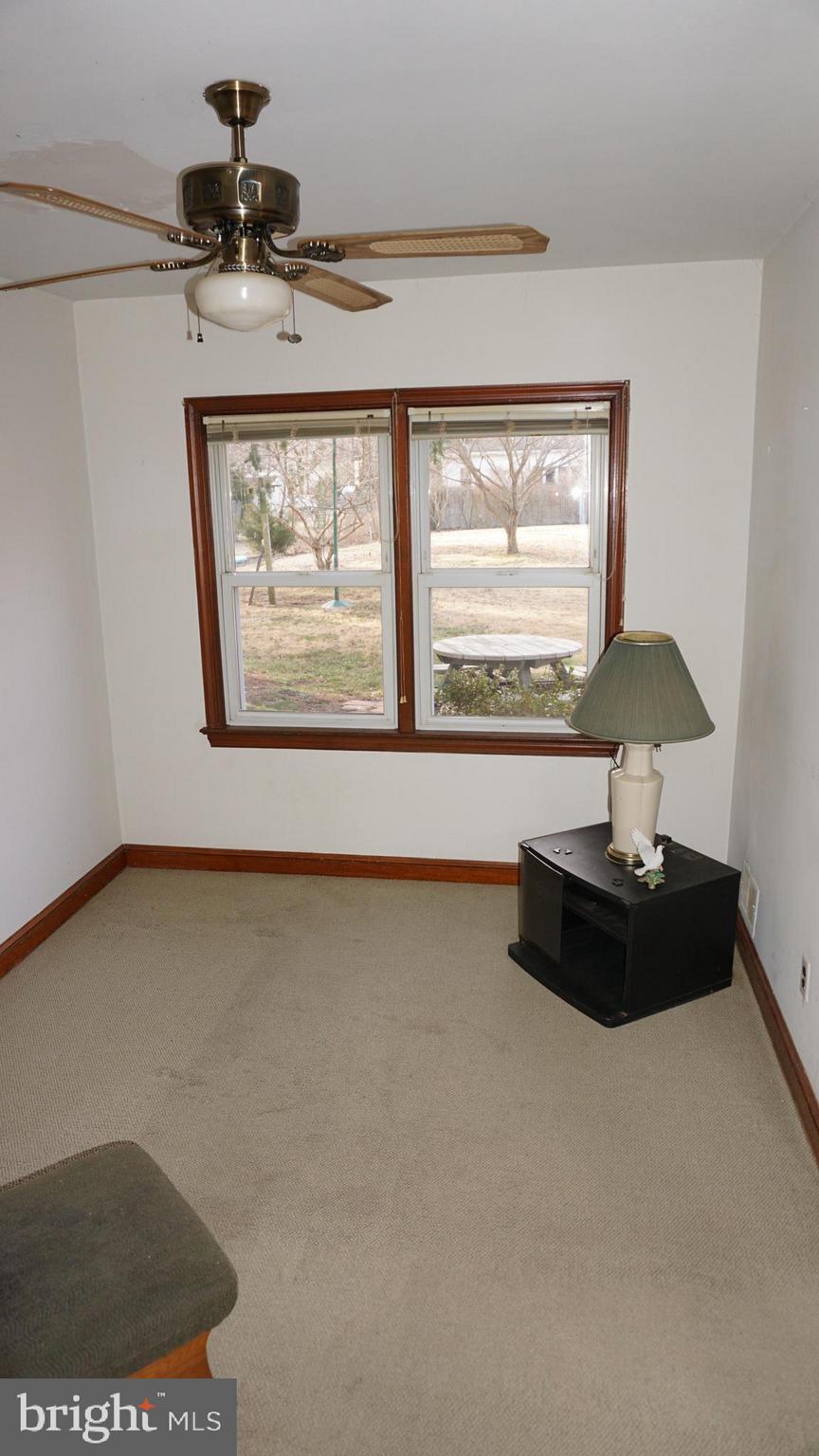 45927 Rolling Road Lexington Park, MD 20653 - Photo 21 of 31 a floor to ceiling window and a table